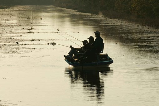 Sports Junkies radio advertising with image of 3 men fishing in a boat